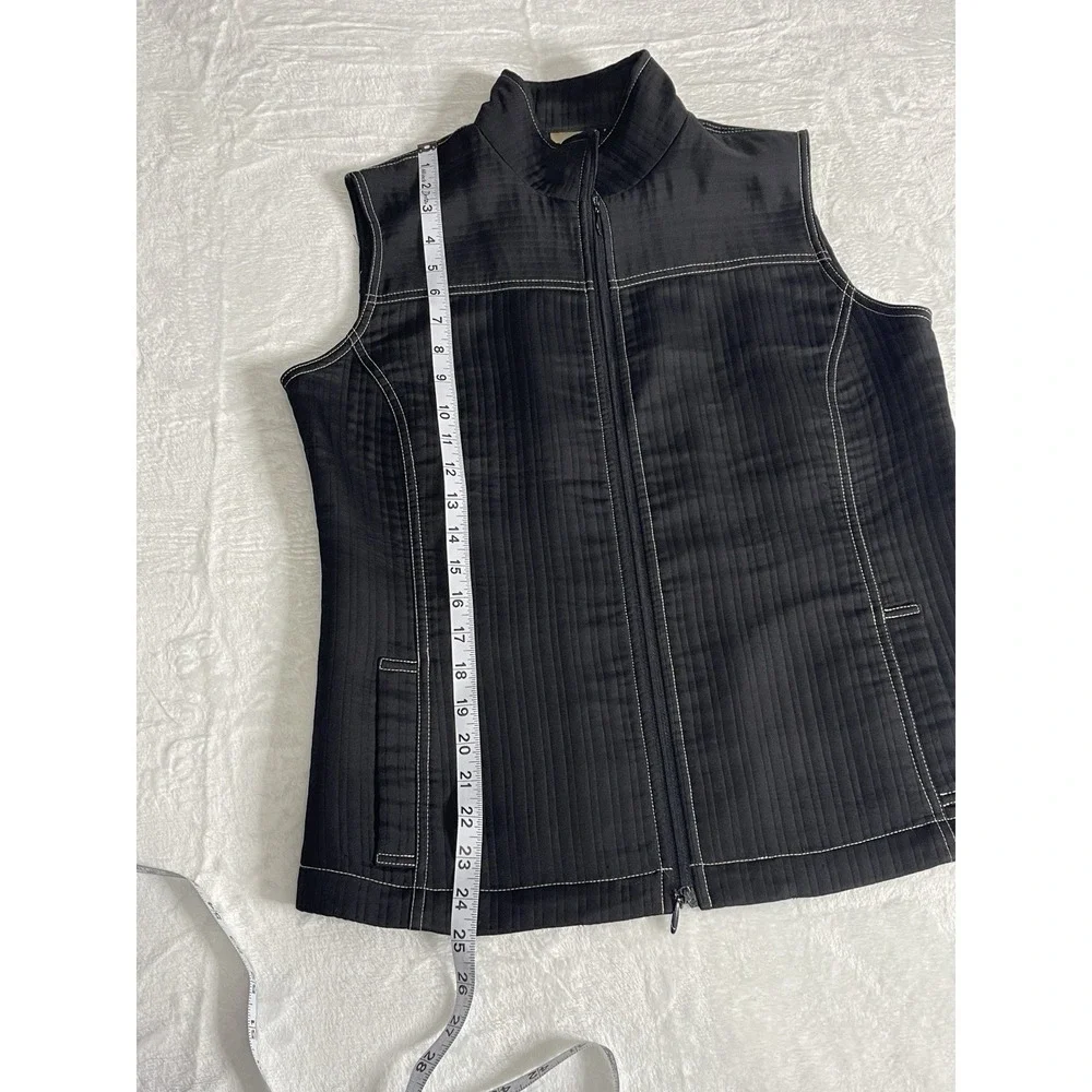 Chico's Vest Size 1 Zip up front pockets on front Black With White Stitching‎